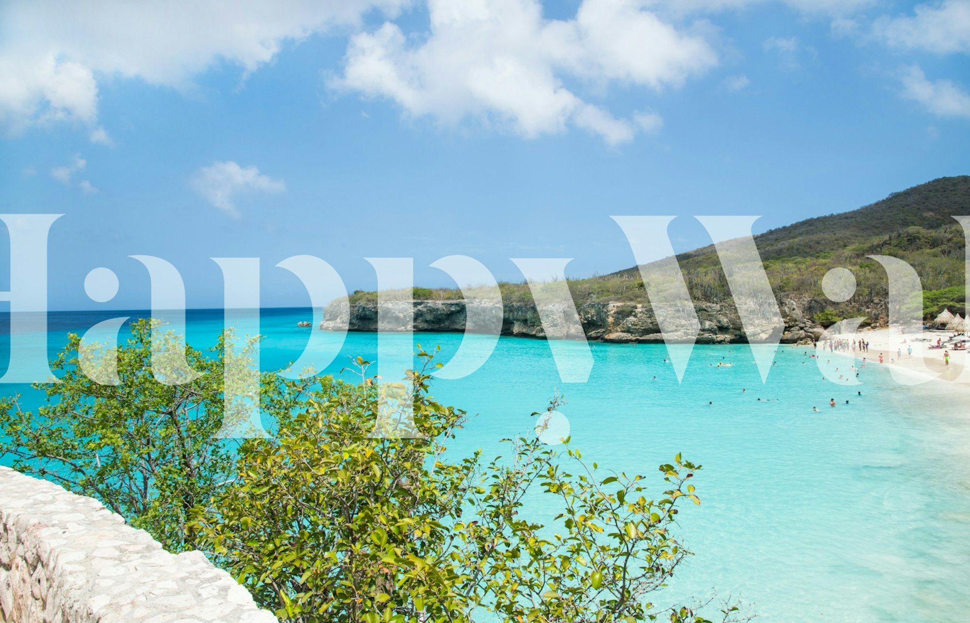 Tropical Grote Knip Beach with clear blue waters and sandy shores in Curacao.