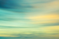 Blurred sunset sky in turquoise blue behang