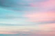 Blue and pink sunset sky, blurred.