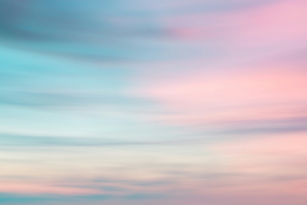 Blue and pink sunset sky, blurred.