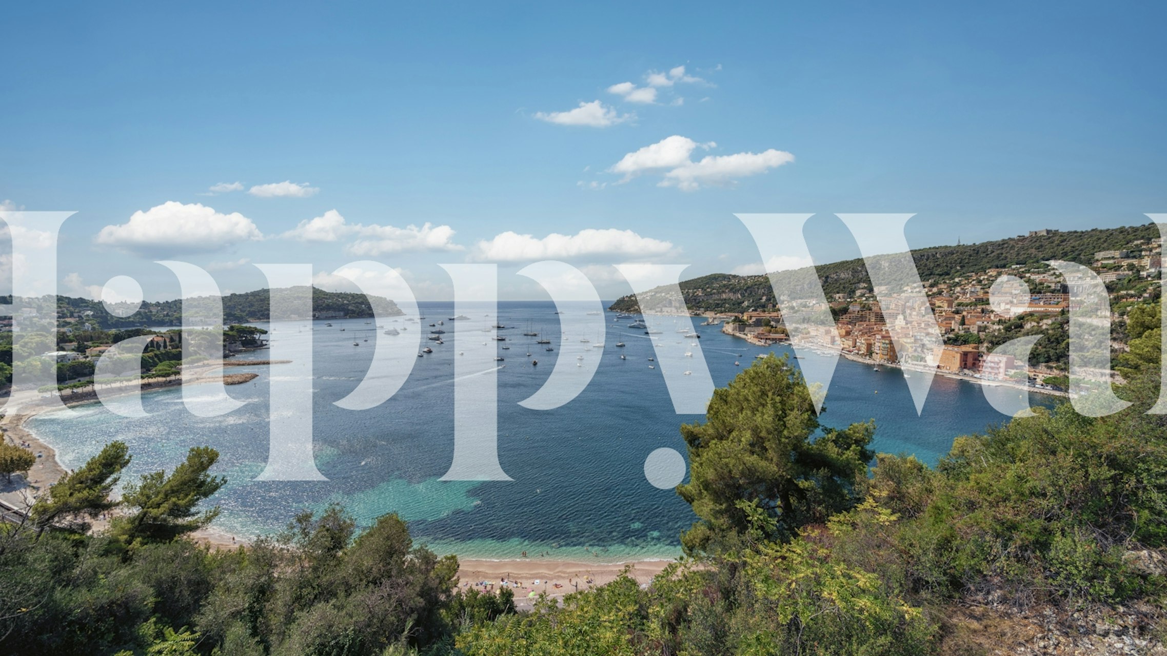 Coastal landscape with blue waters and green trees wallpaper