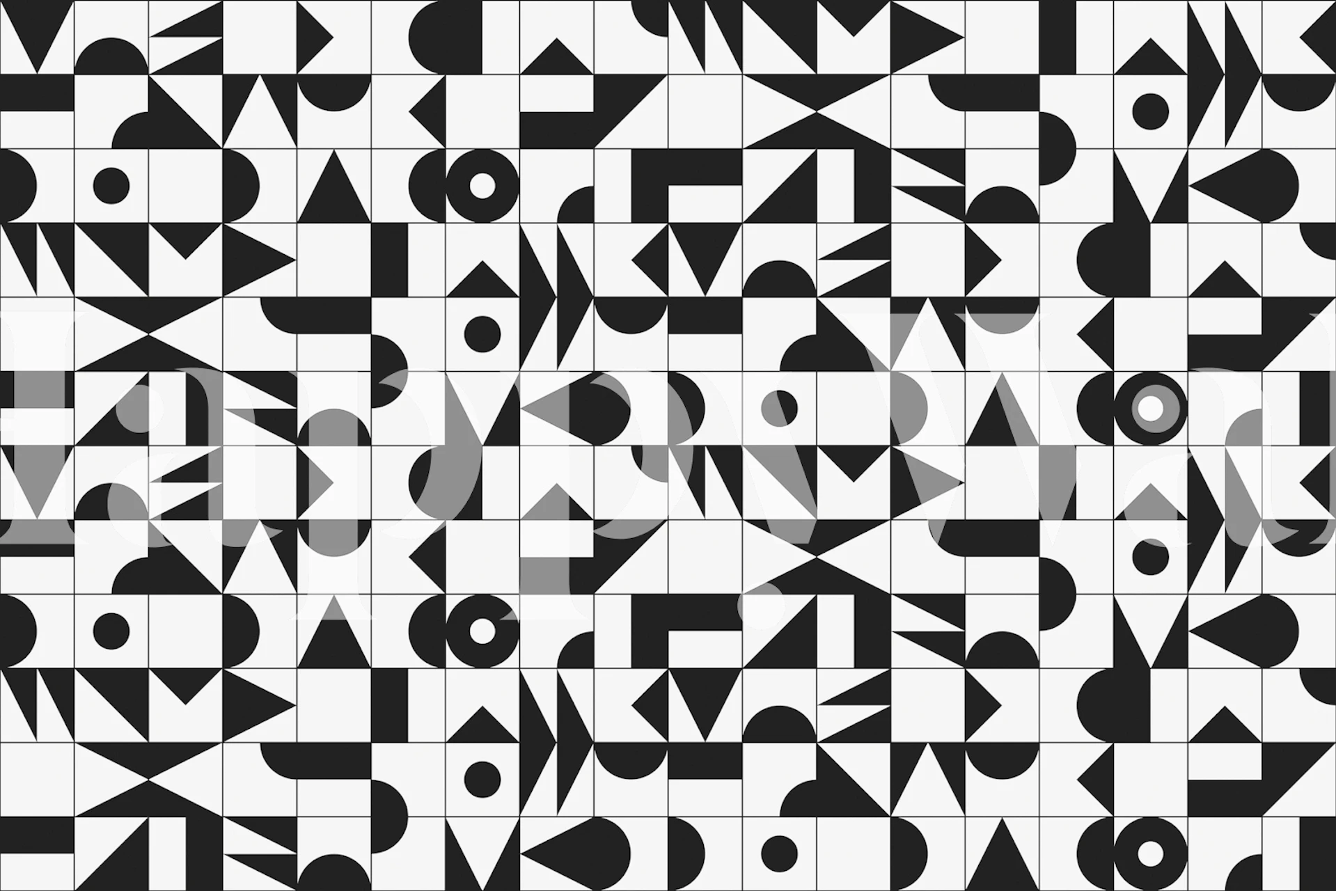Geometric black and white wallpaper design in a room