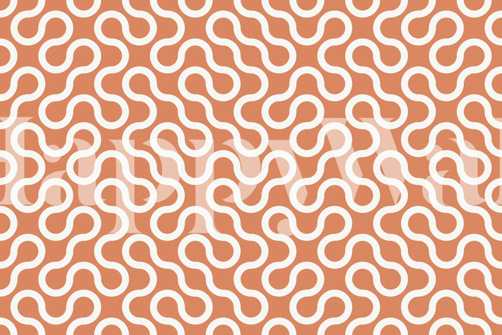 Geometric pattern in peach and white on wallpaper