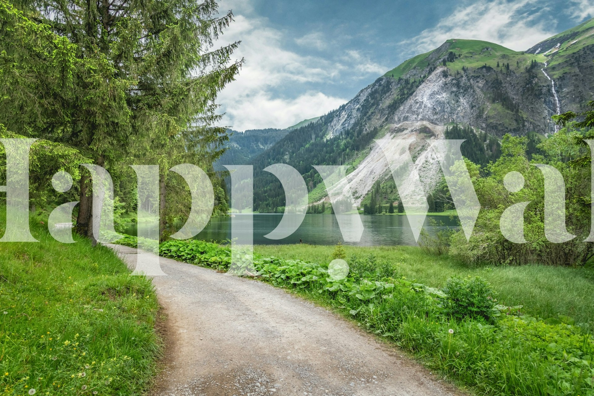 Scenic lake surrounded by greenery and mountains wallpaper