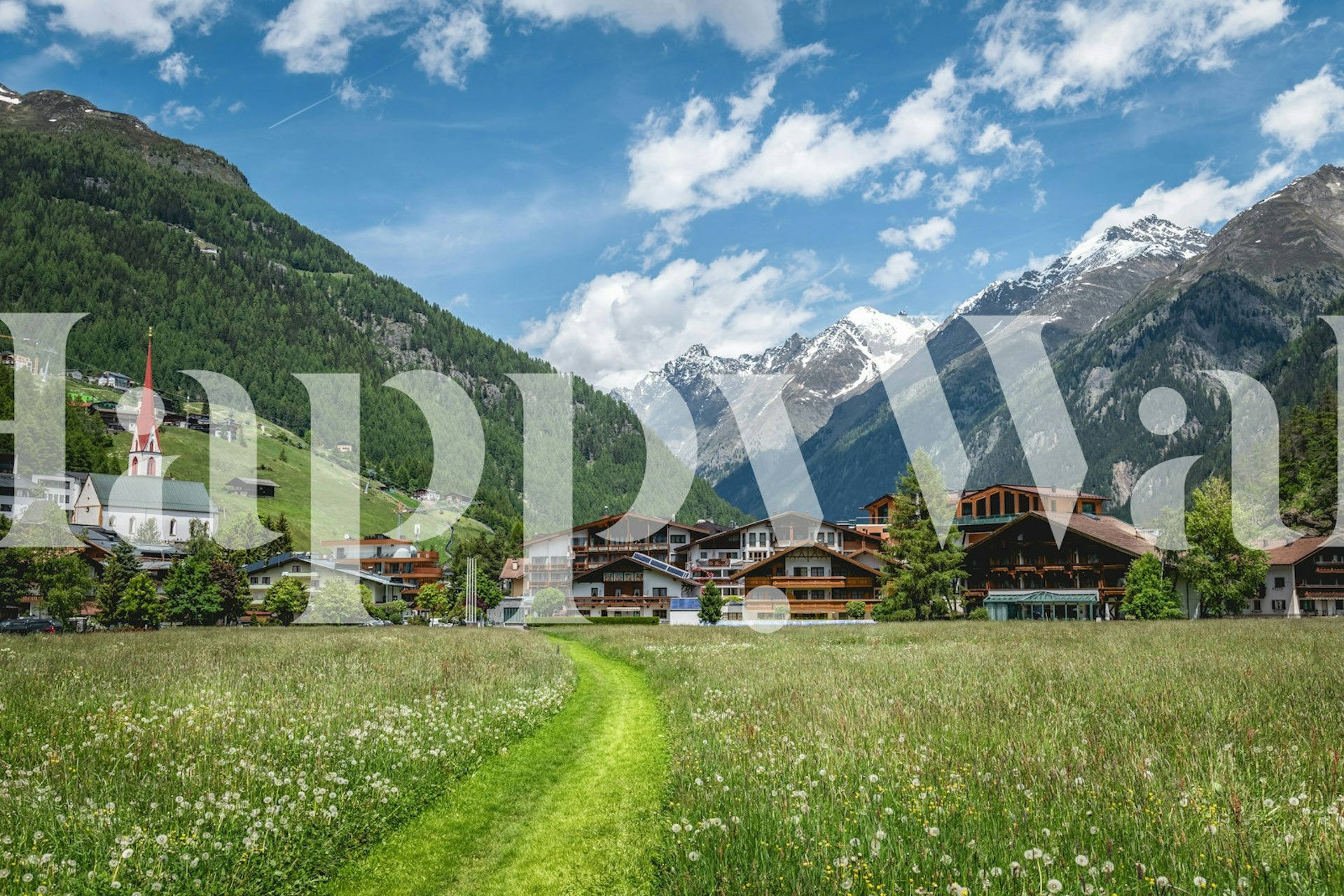 Beautiful mountain scenery with green landscape and buildings wallpaper