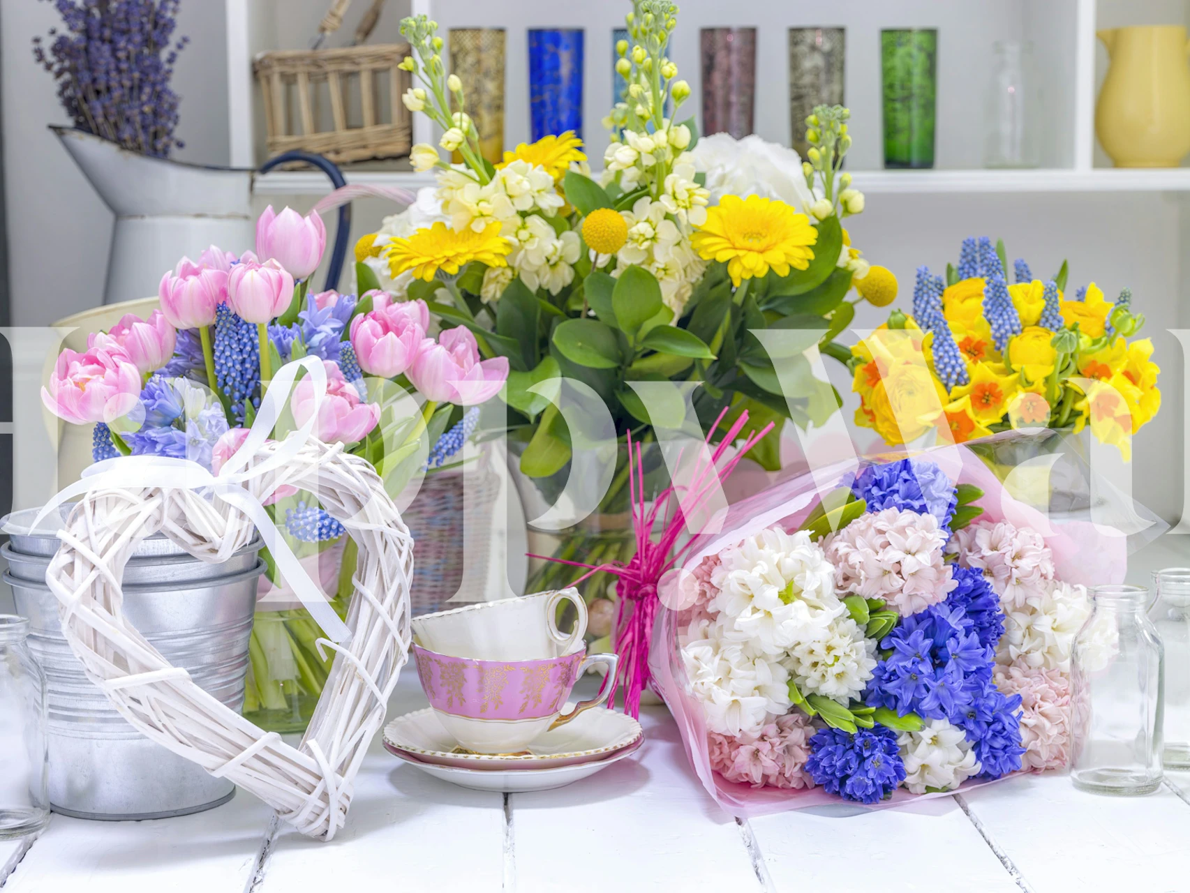 Wallpaper featuring flowers and cups in a room