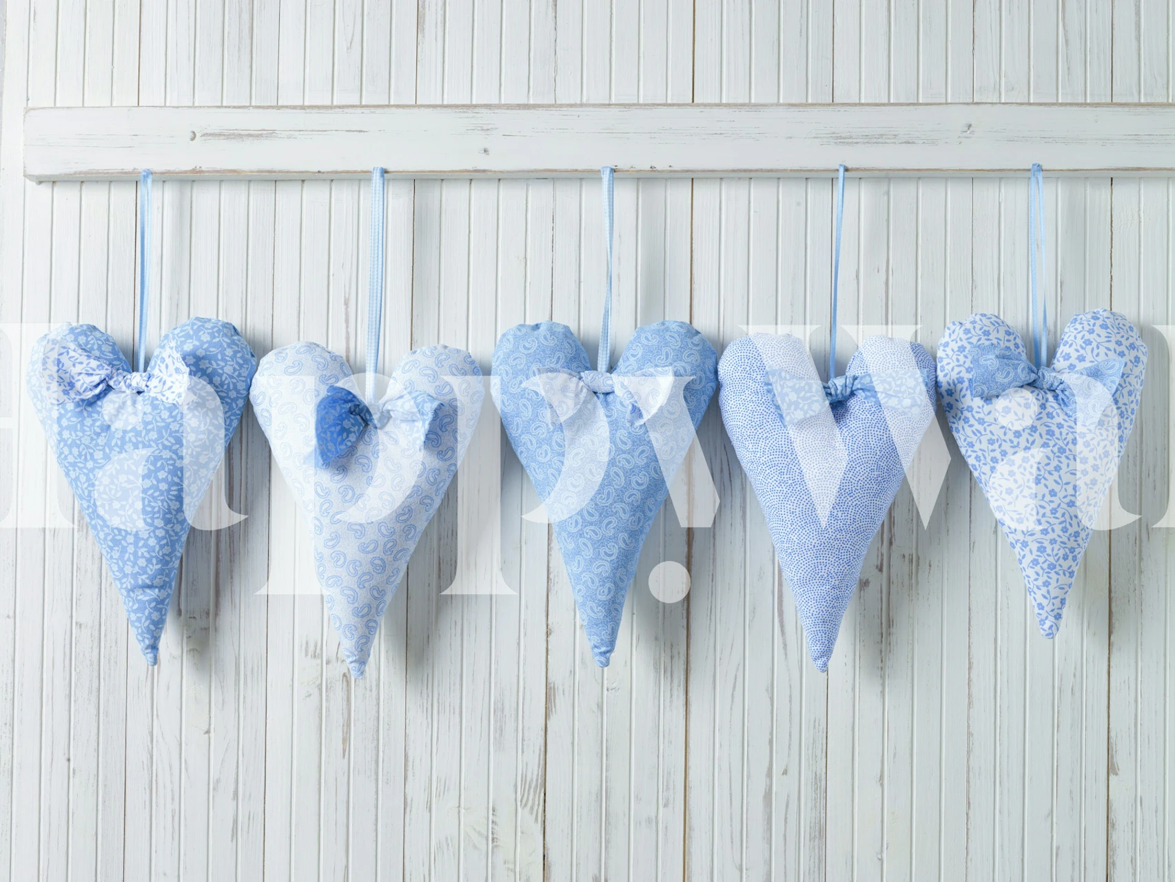 Hanging hearts wallpaper in a room