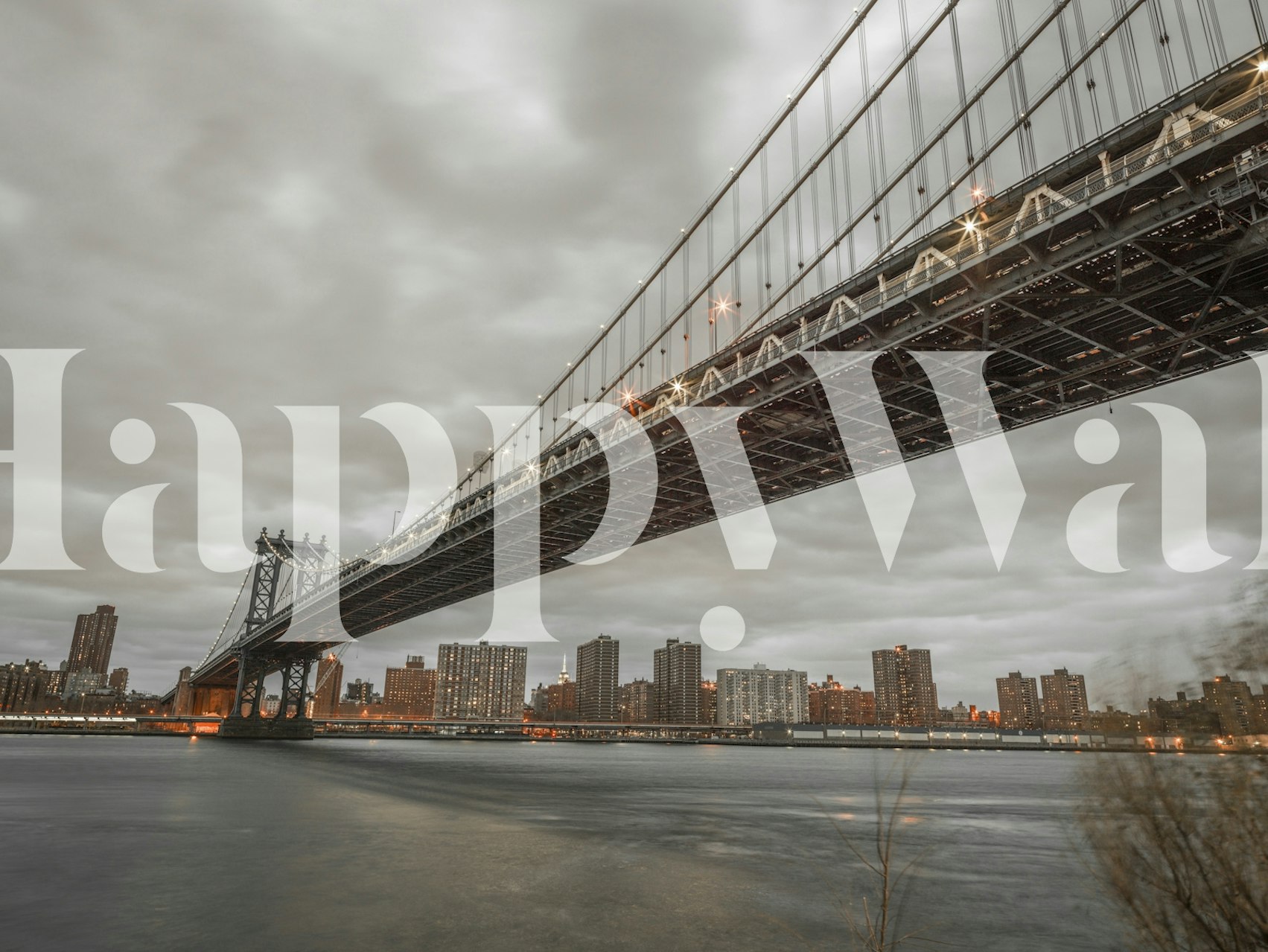 Gray urban bridge wallpaper with city skyline and cloudy sky