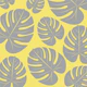 Taupe palm leaves yellow background