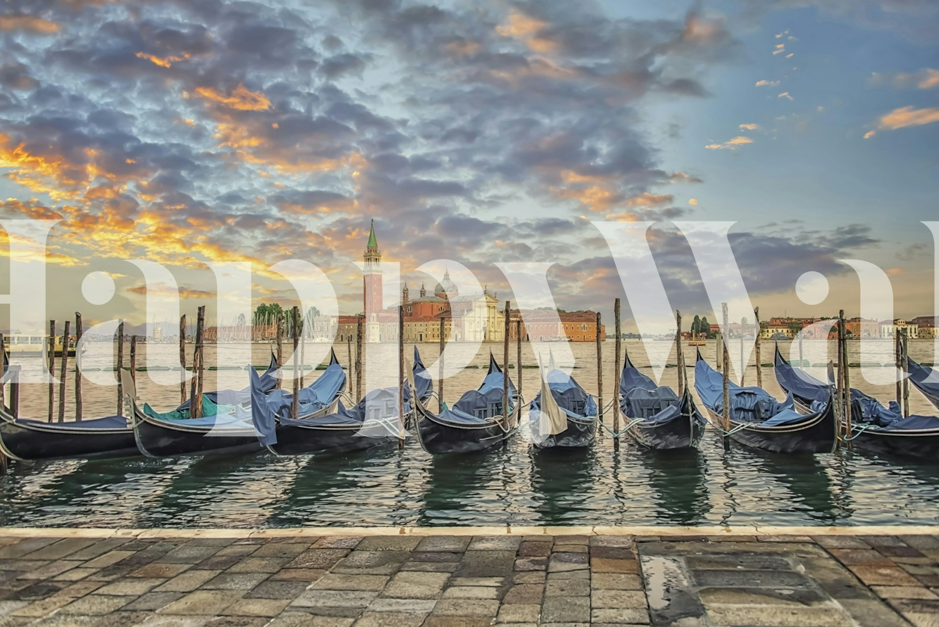 Gondolas on the water at sunset with blue skies wallpaper