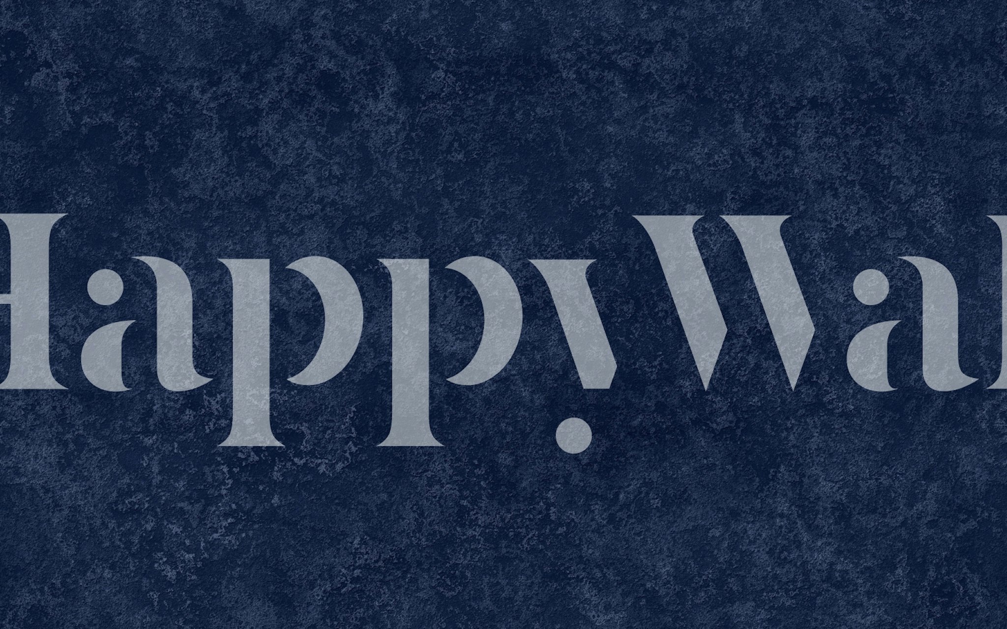 Rough textured royal blue wallpaper with a matte finish