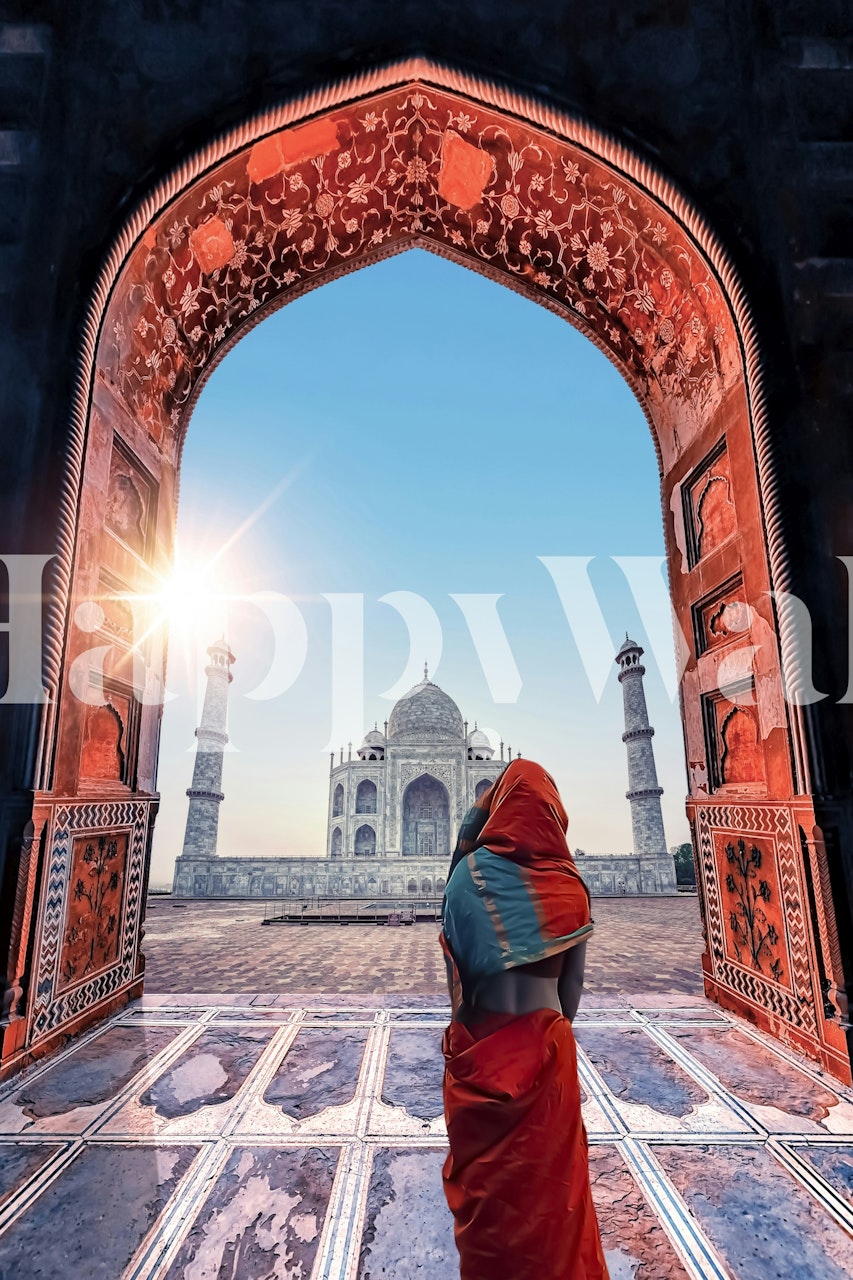 Taj Mahal view through an ornate archway, red and blue tones wallpaper