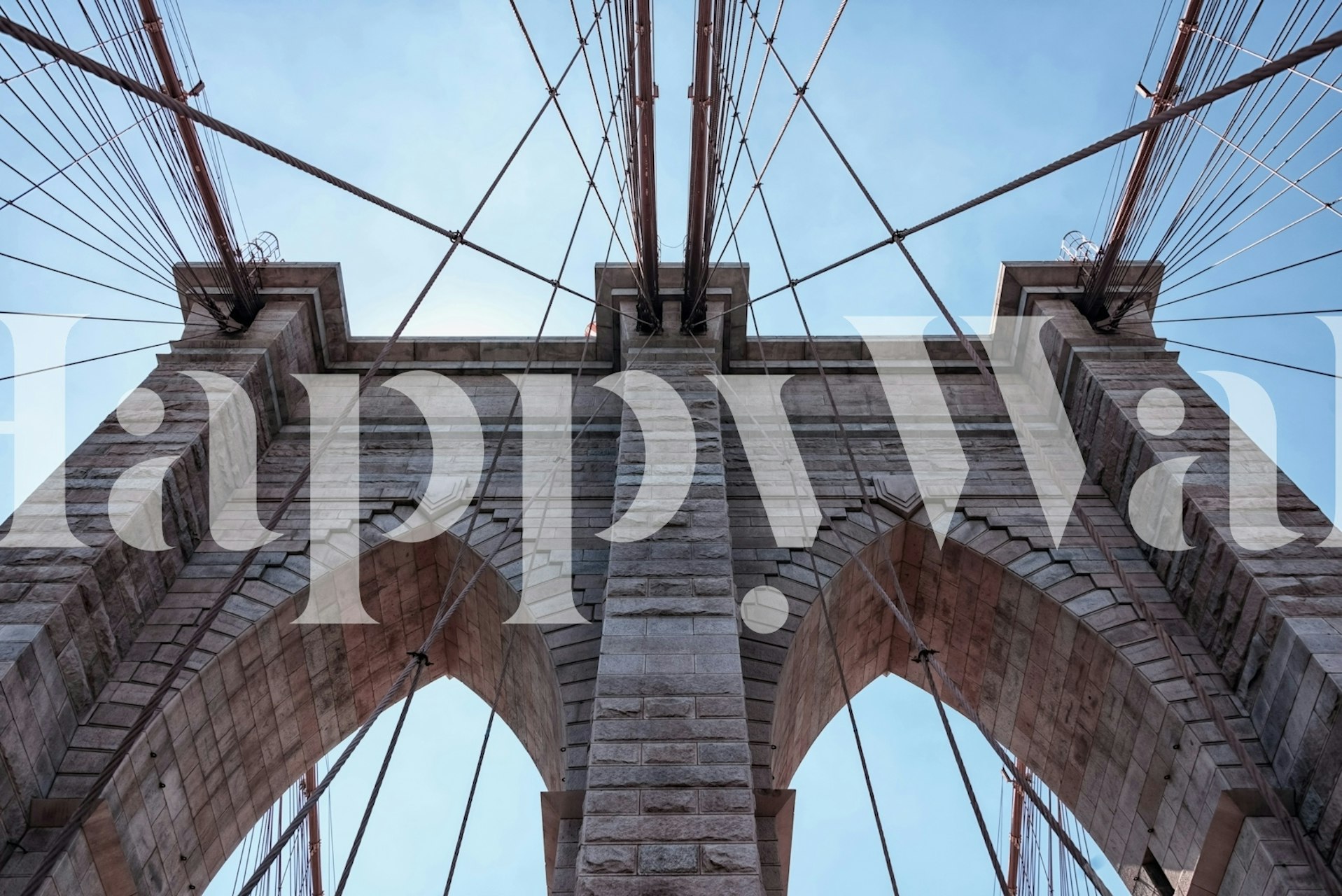 Stone pillar with cable wires against a blue sky wallpaper
