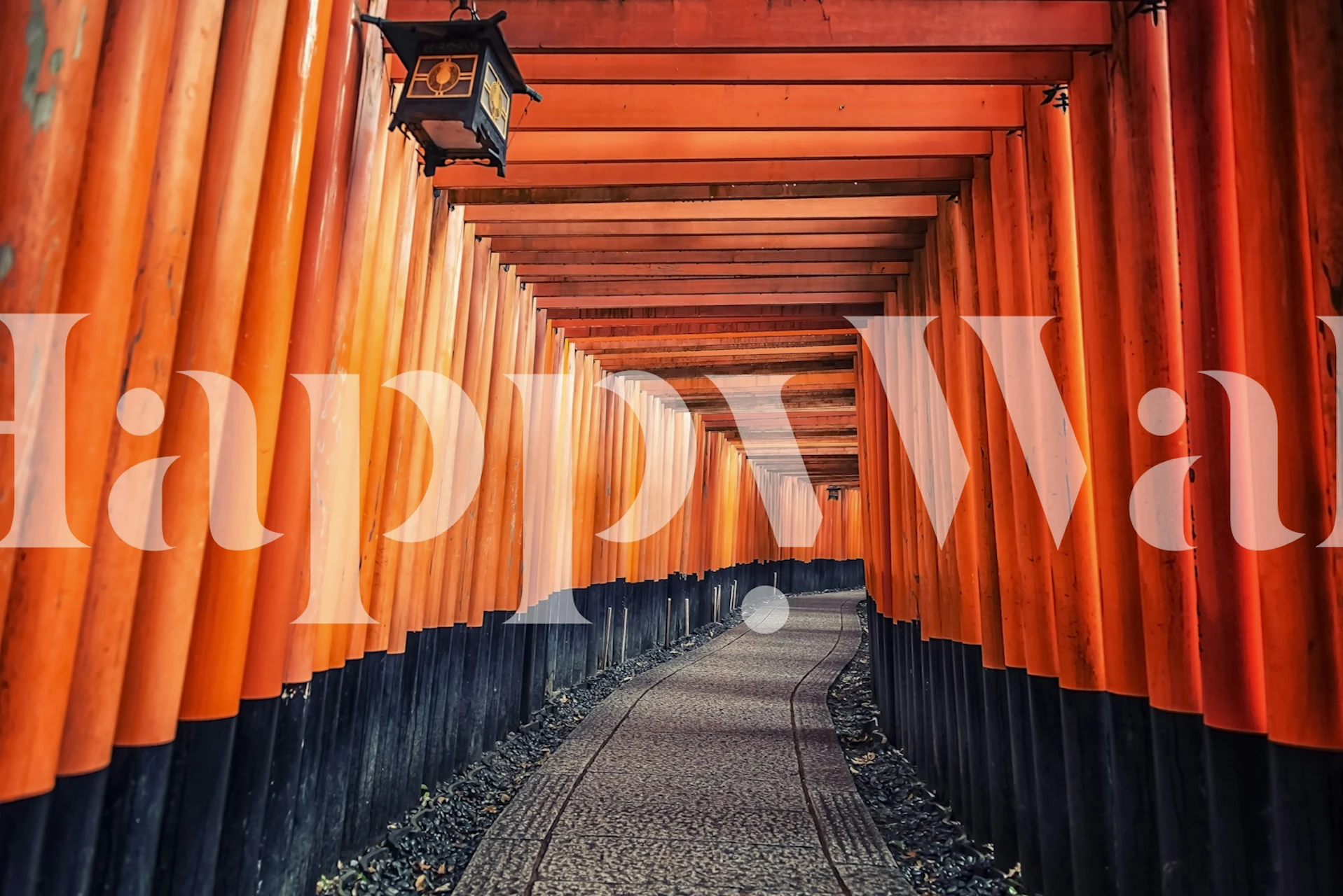 Vibrant orange pillars with black bases and textured path wallpaper