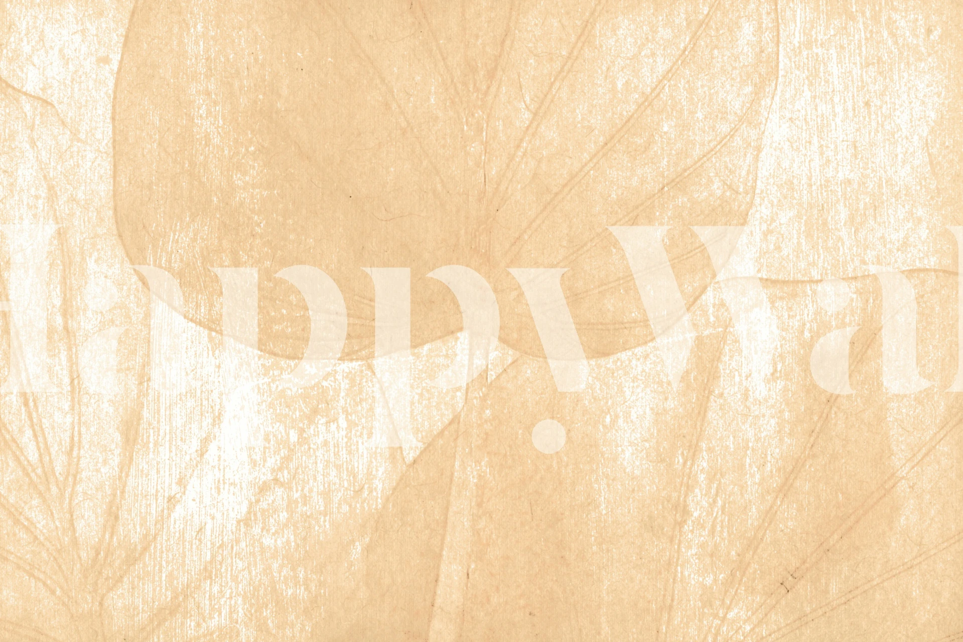 Warm washed out tropical leaves wallpaper in a room