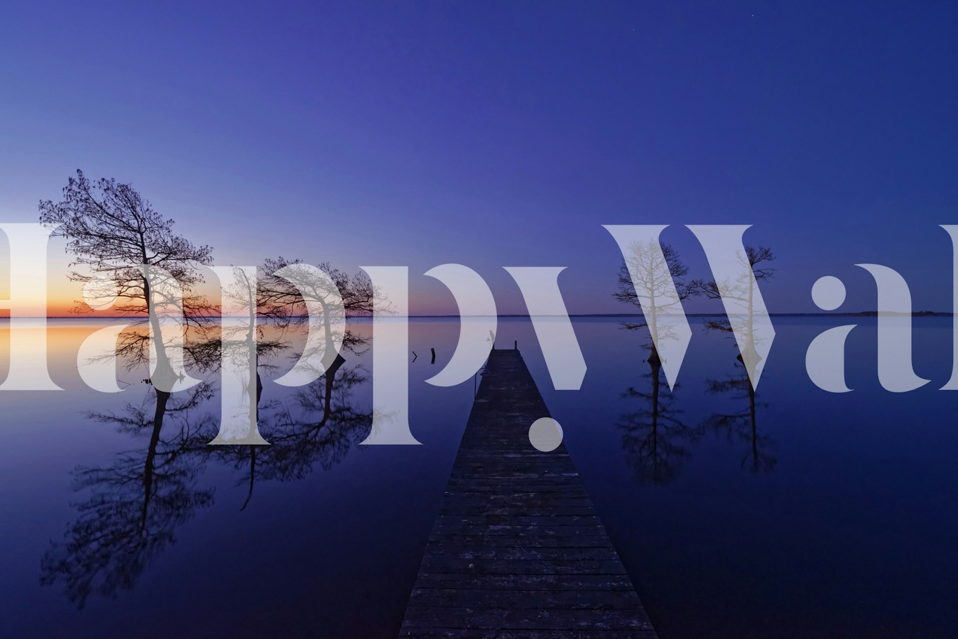 Calm lake at sunset with wooden pier and silhouetted trees wallpaper