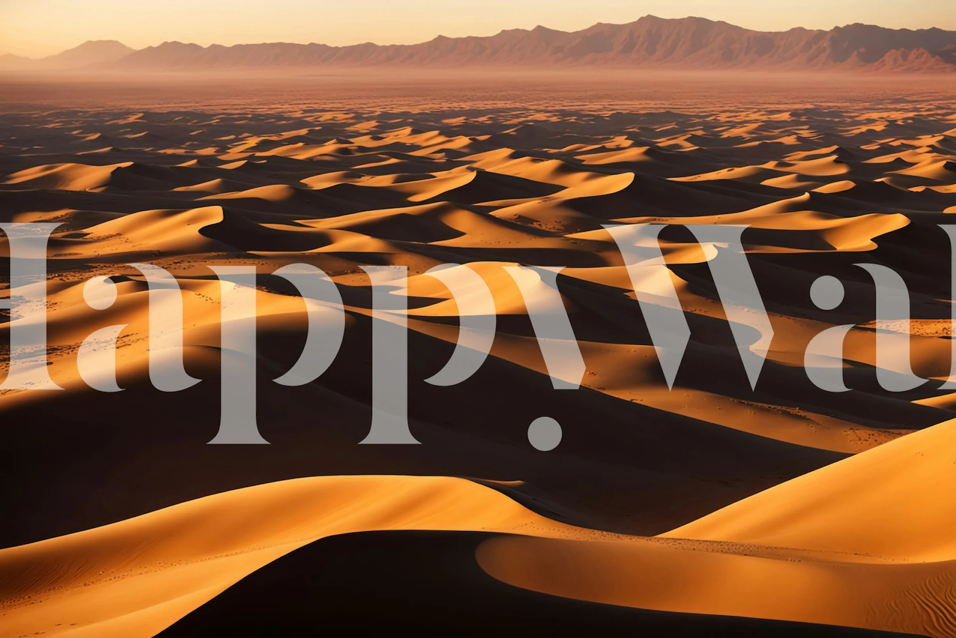 Sandy desert waves in golden hues wallpaper