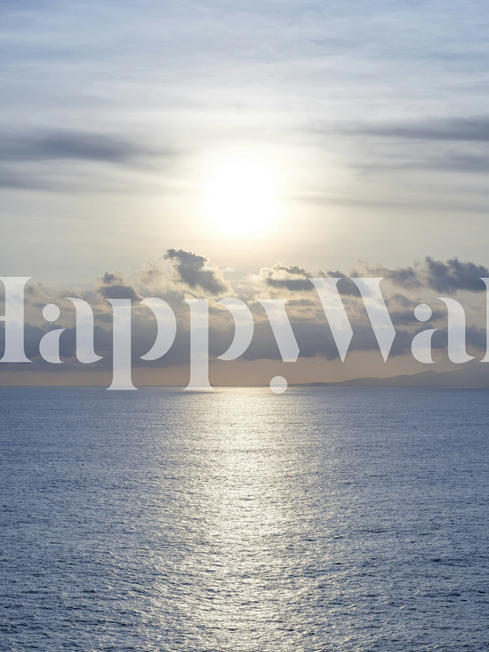 Calm ocean view with sunlight reflecting on blue water wallpaper