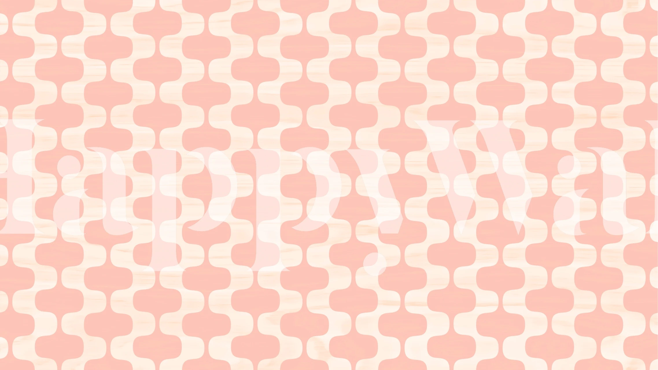 Blush pink geometric wallpaper in a styled room