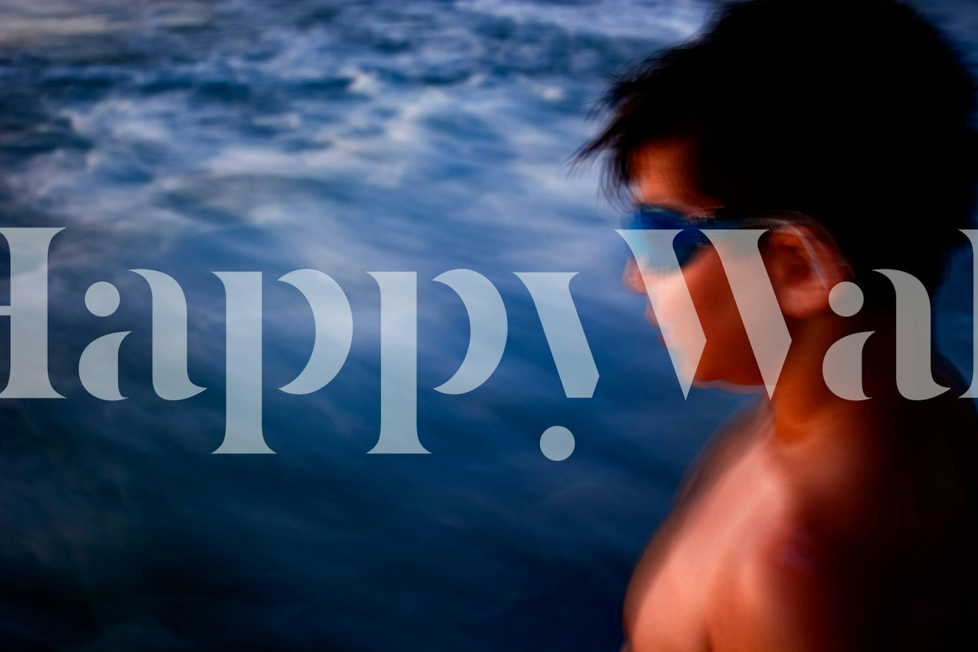 Ocean waves in blue and white with blurred motion wallpaper