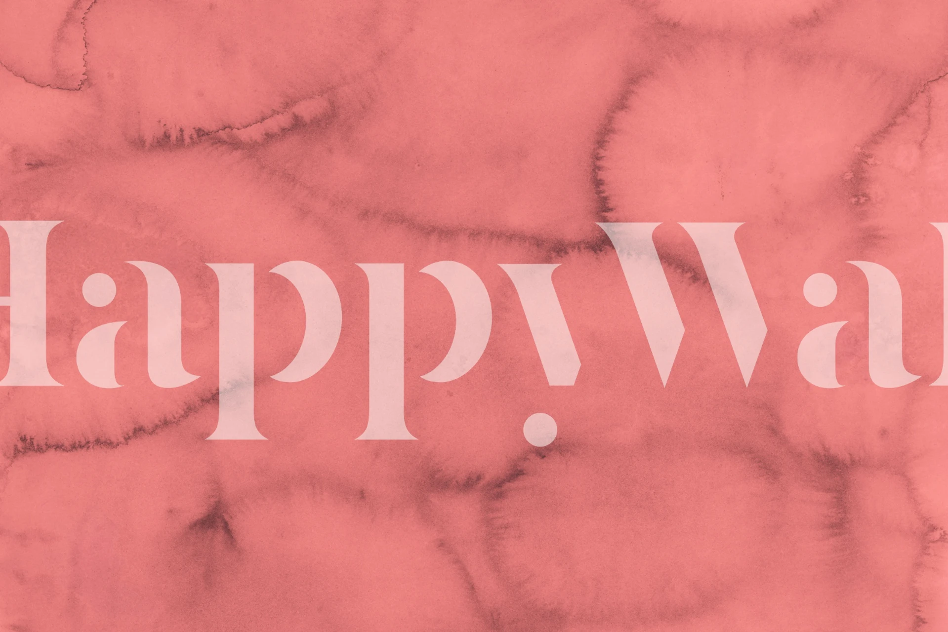 Abstract coral pink wallpaper showing soft circular patterns