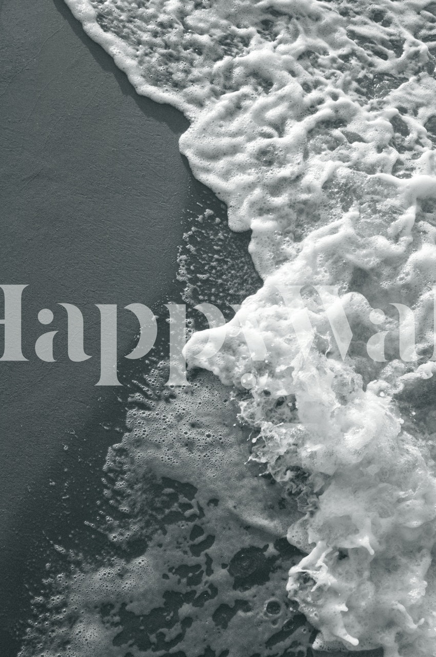 Ocean waves crashing onto shore in gray tones wallpaper