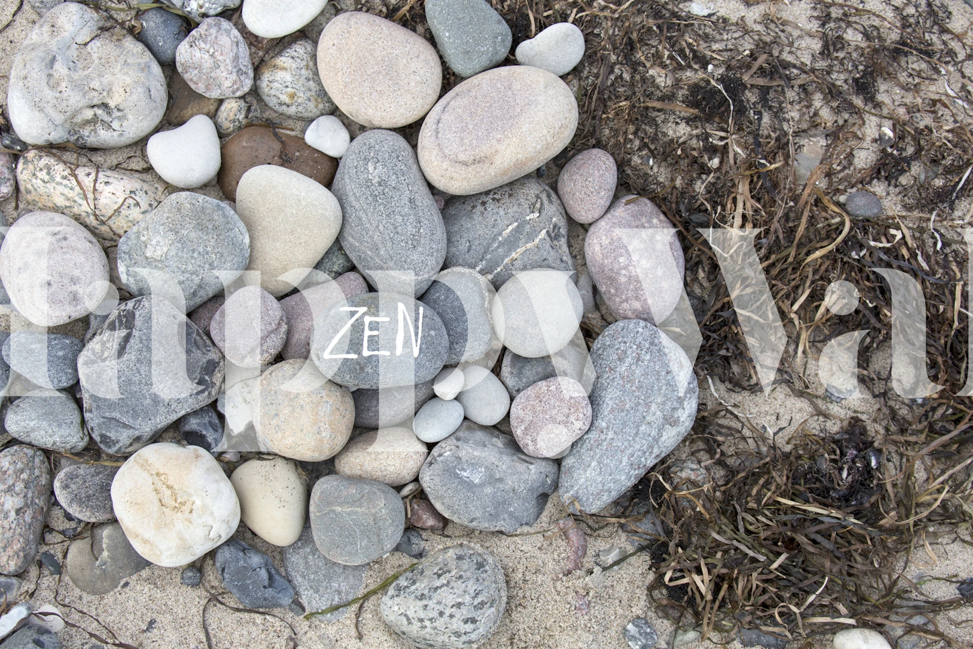 Gray pebbles with a white 'ZEN' stone in a natural layout wallpaper