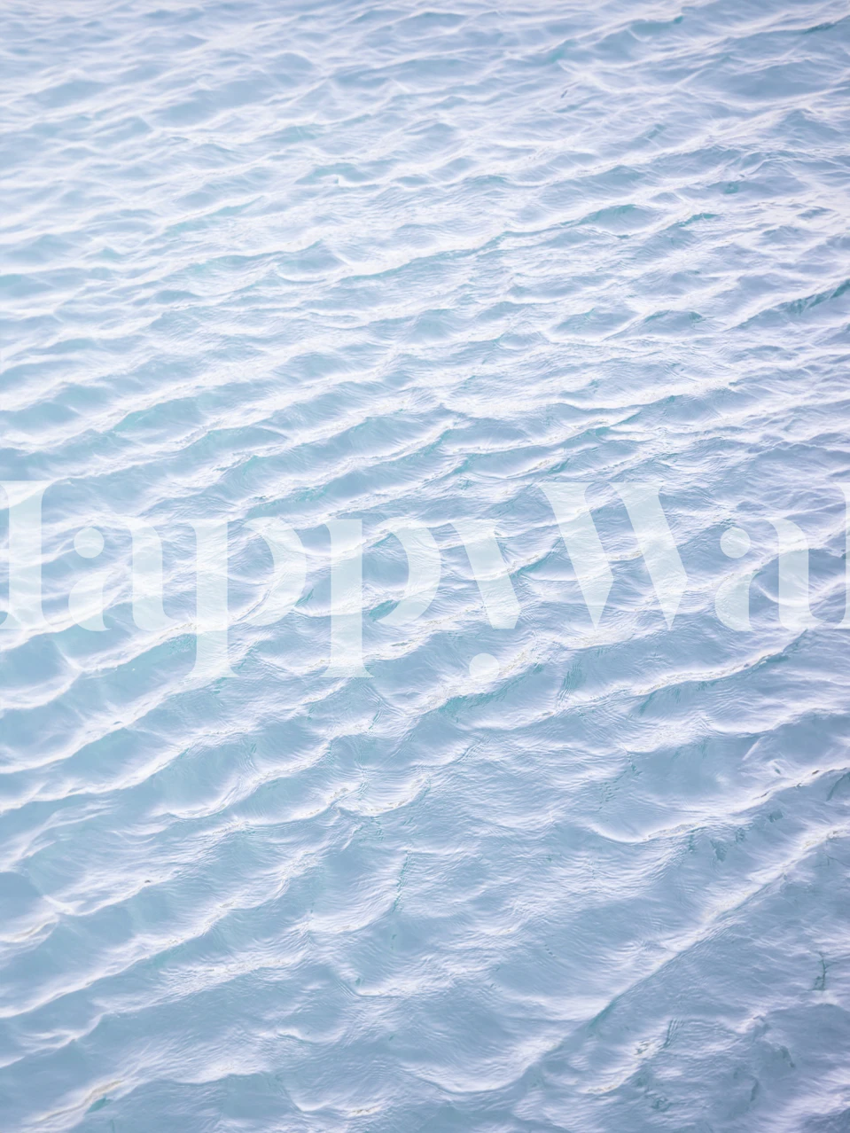 rippling water surface in light blue tones wallpaper