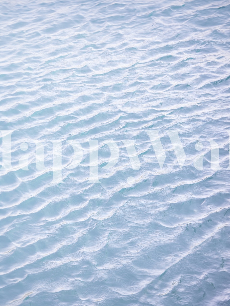 rippling water surface in light blue tones wallpaper